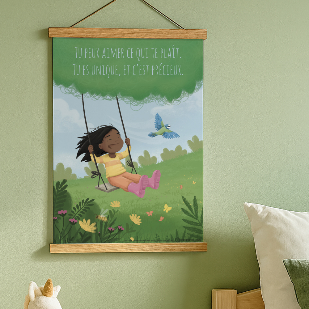 L'affiche tirée de l'album jeunesse "Bottes roses et cheveux au vent" avec le texte "Tu peux aimer ce qui te plait, tu es unique et c'est précieux"